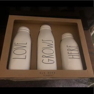 Rae Dunn love grows here bottles